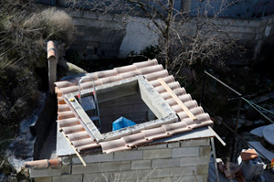 Roof almost tiled